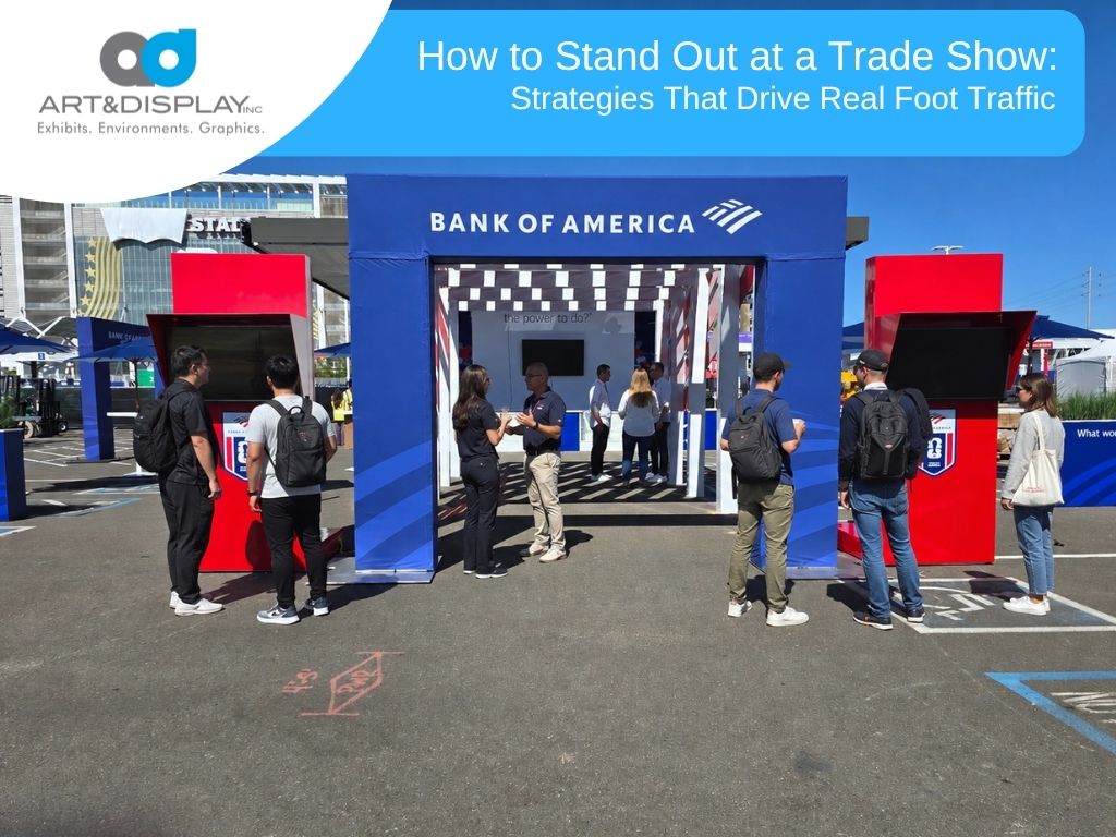 Bank of America trade show booth with attendees interacting with staff and digital displays.