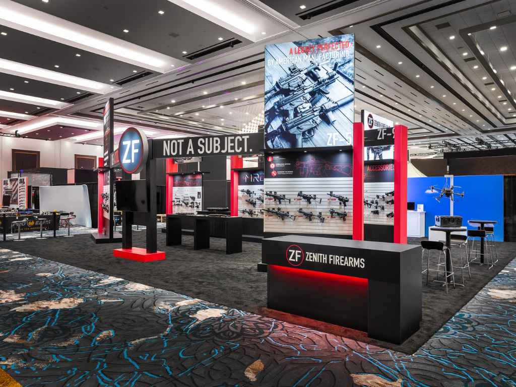 User-Inserted Custom trade show exhibit for zenith firearms with display of firearms and accessories.