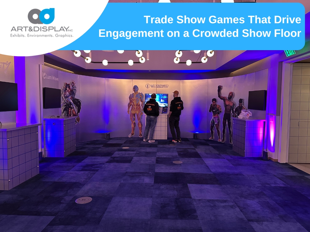 Trade show booth with character cutouts and interactive screens for engagement.